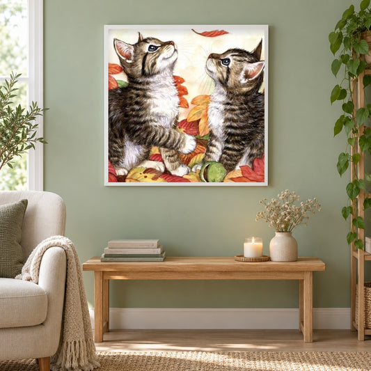 Kätzchen & Herbstlaub als gerahmtes Diamond Painting im Wohnzimmer